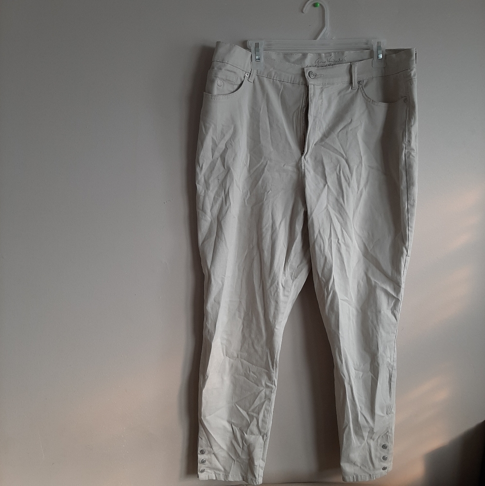 Cream-colored straight legged jeans